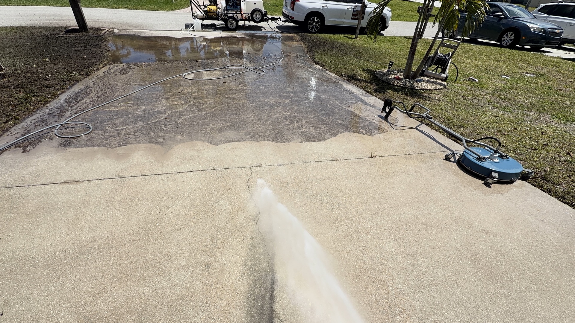 Driveway mid-clean showing the difference